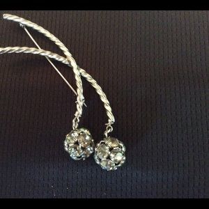 Antique silver pin with decorative stones